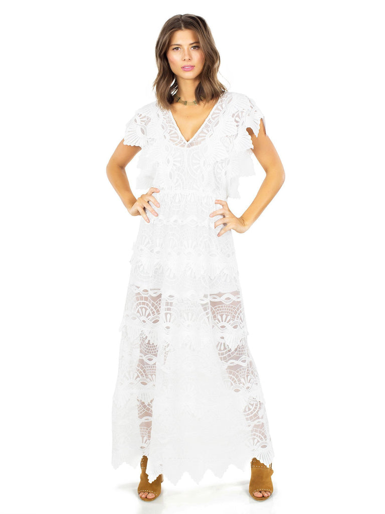 Girl wearing a dress rental from Nightcap Clothing called Mayan Lace Gown