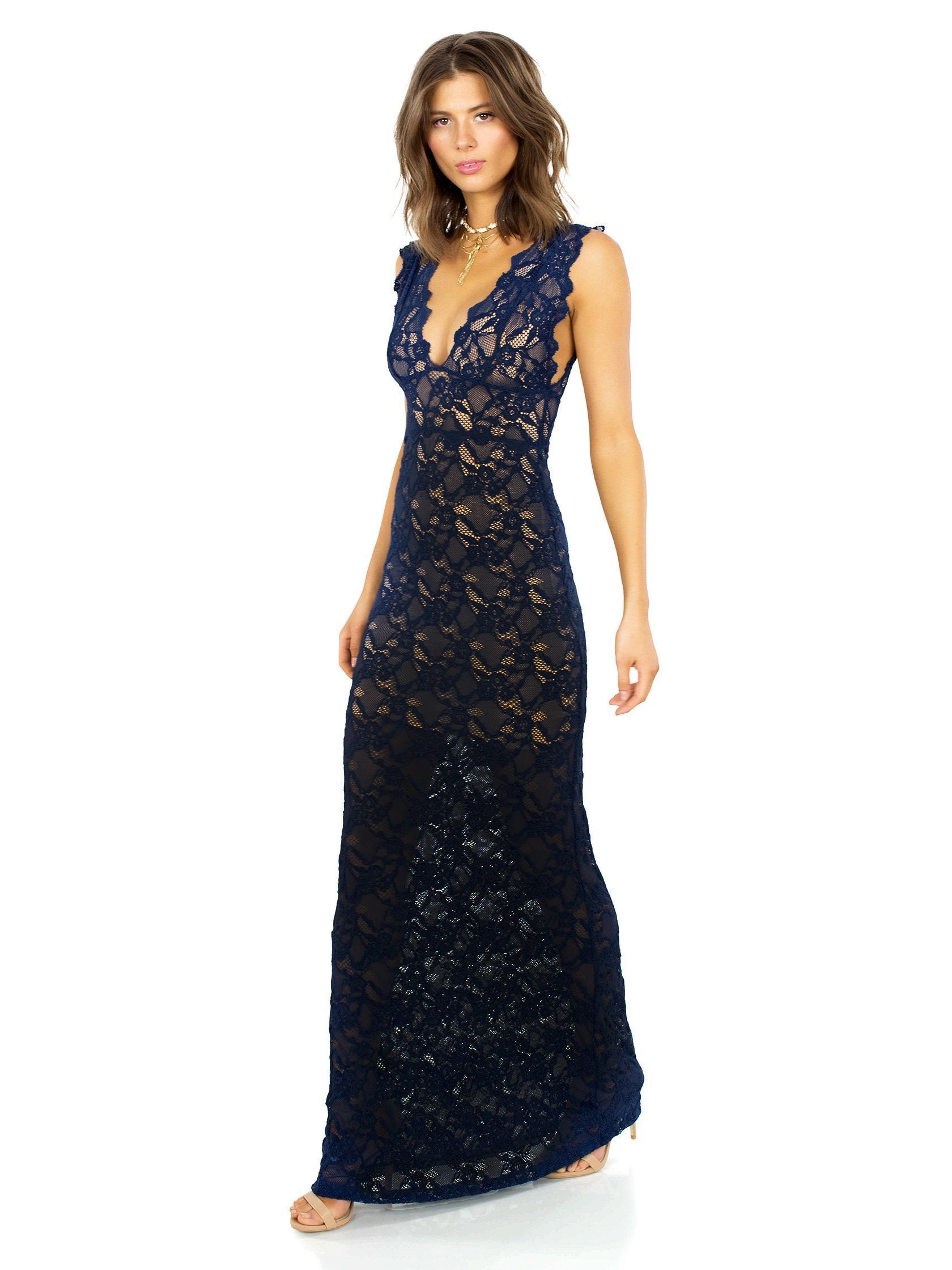 Woman wearing a dress rental from Nightcap Clothing called Perfect Plunge Maxi Dress