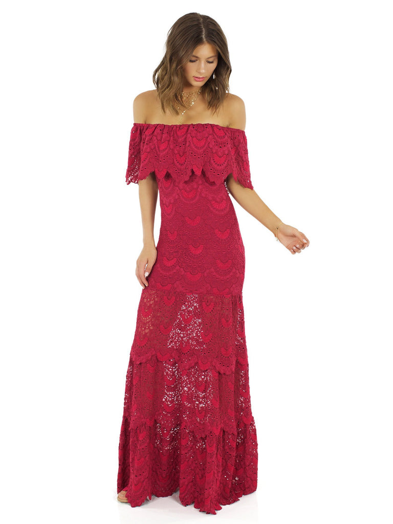 Women outfit in a dress rental from Nightcap Clothing called Mayan Lace Gown