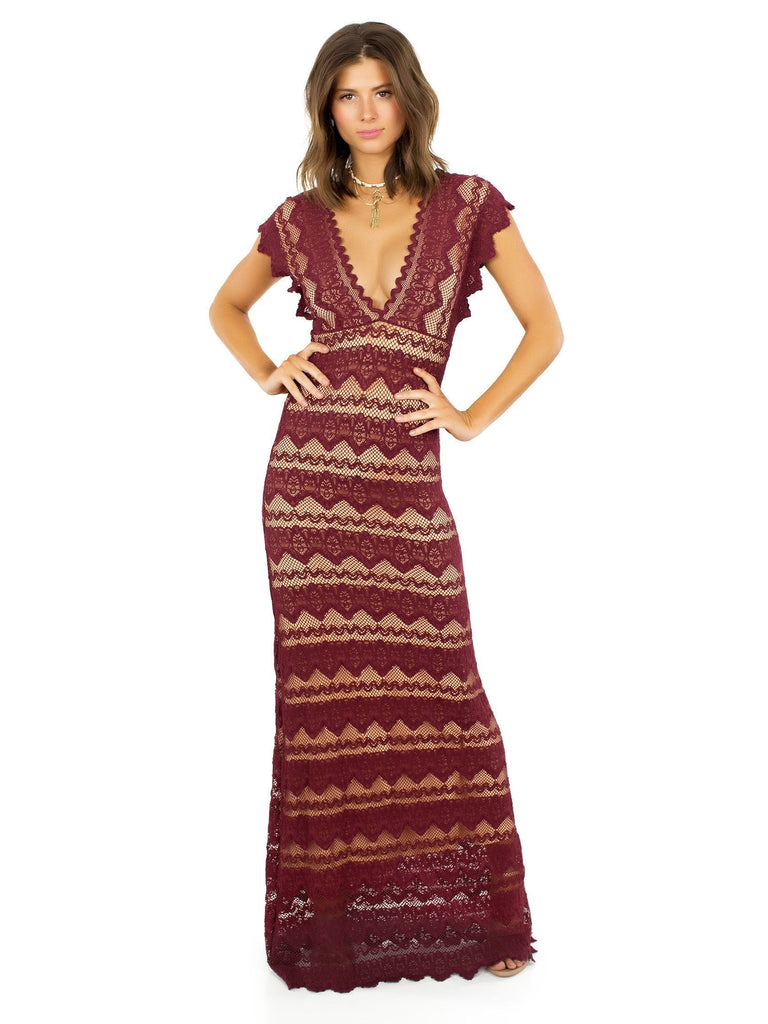 Women wearing a dress rental from Nightcap Clothing called Imperial Maxi Dress