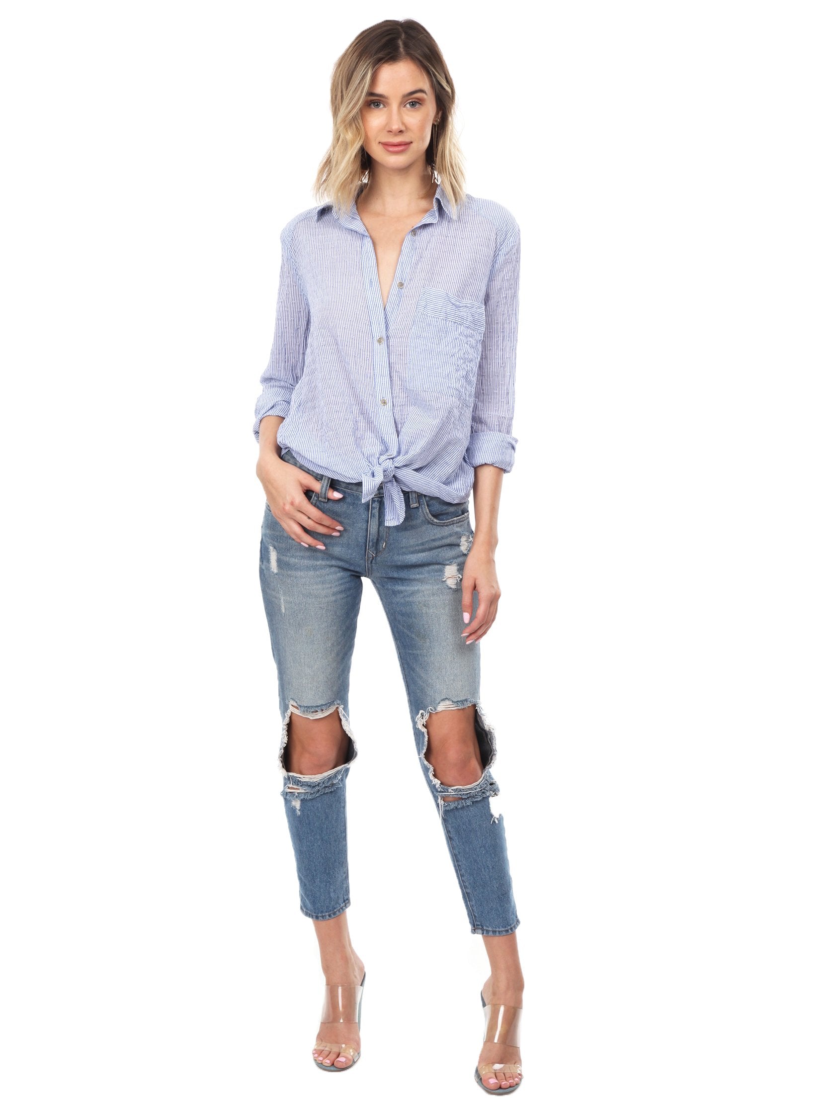 Woman wearing a top rental from Free People called No Limits Stripe Stretch Cotton Shirt