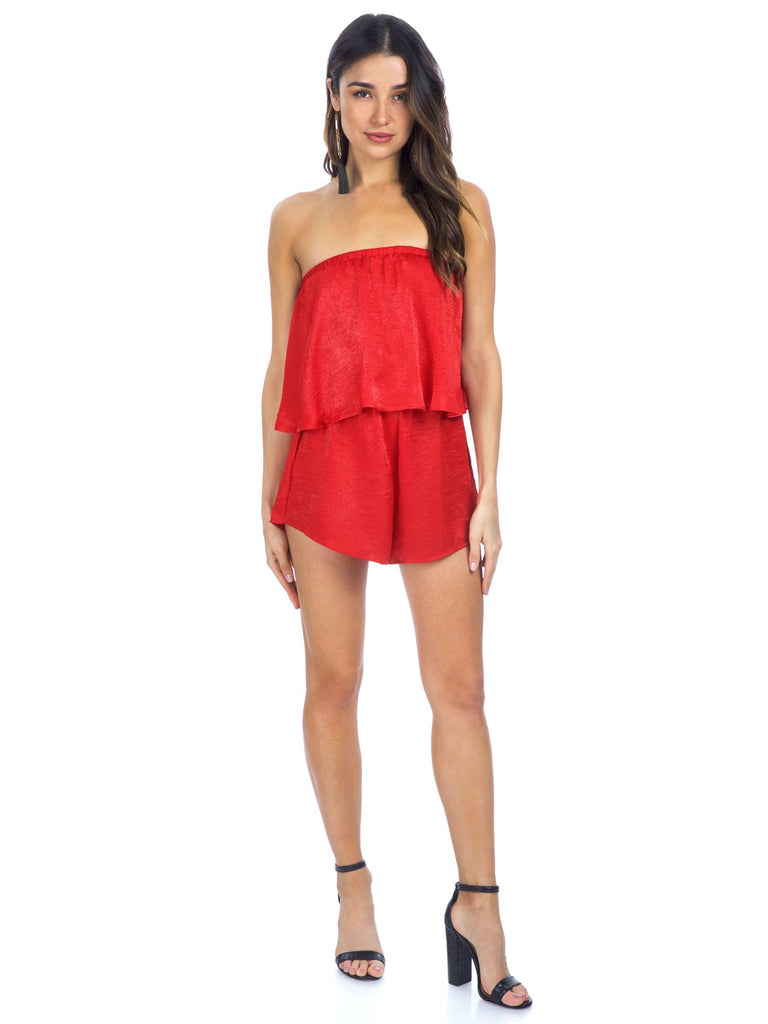 Girl wearing a romper rental from Show Me Your Mumu called Marianne Wrap Dress