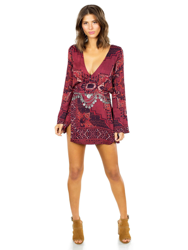 Woman wearing a dress rental from The Jetset Diaries called Tapestry Mini Dress
