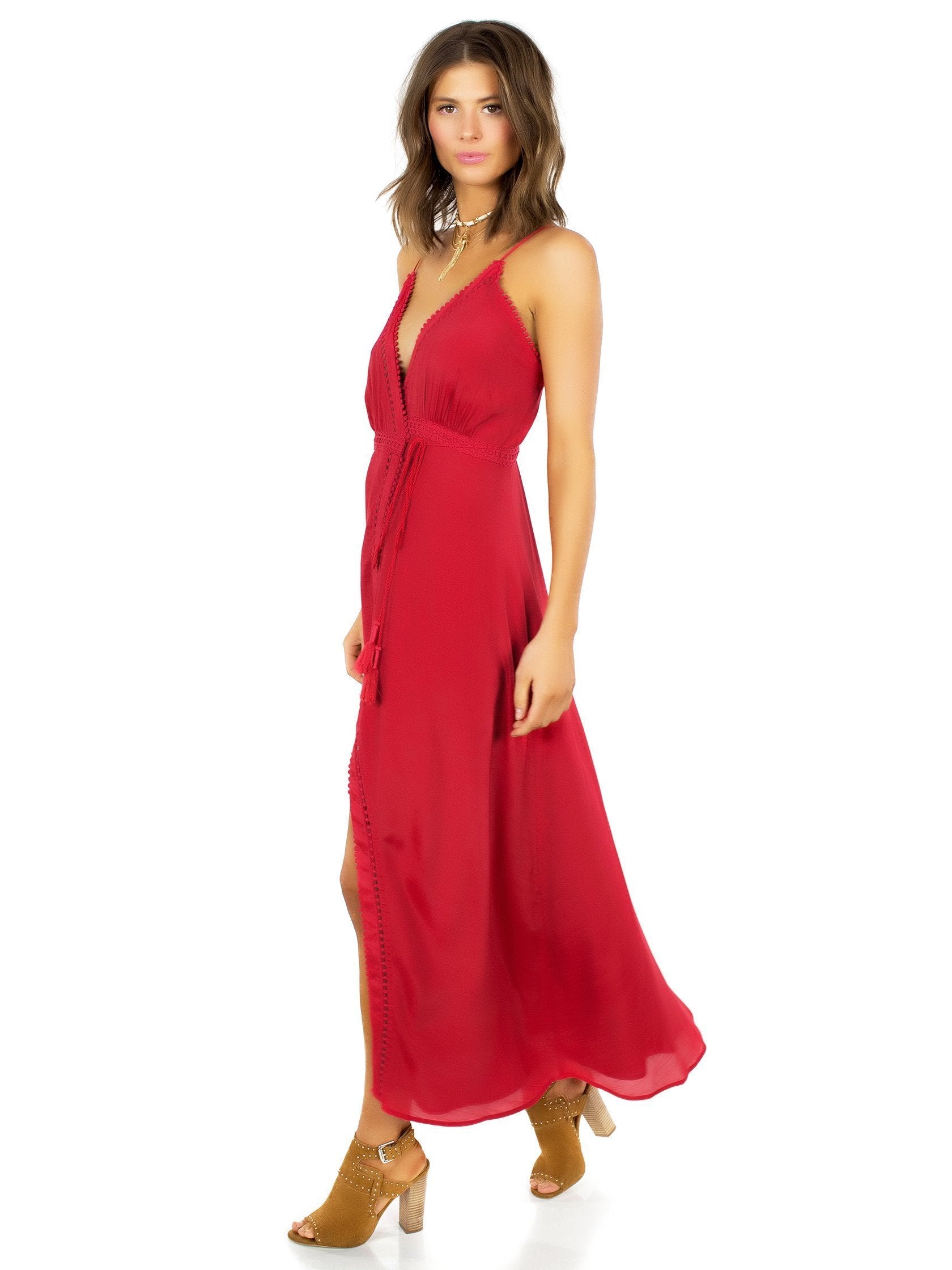 Woman wearing a dress rental from The Jetset Diaries called Regla Midi Dress