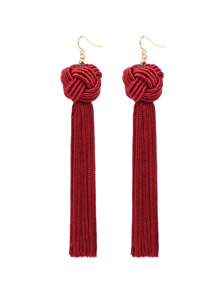 Women wearing a earrings rental from Vanessa Mooney called The Astrid Gold Knotted Tassel Earrings