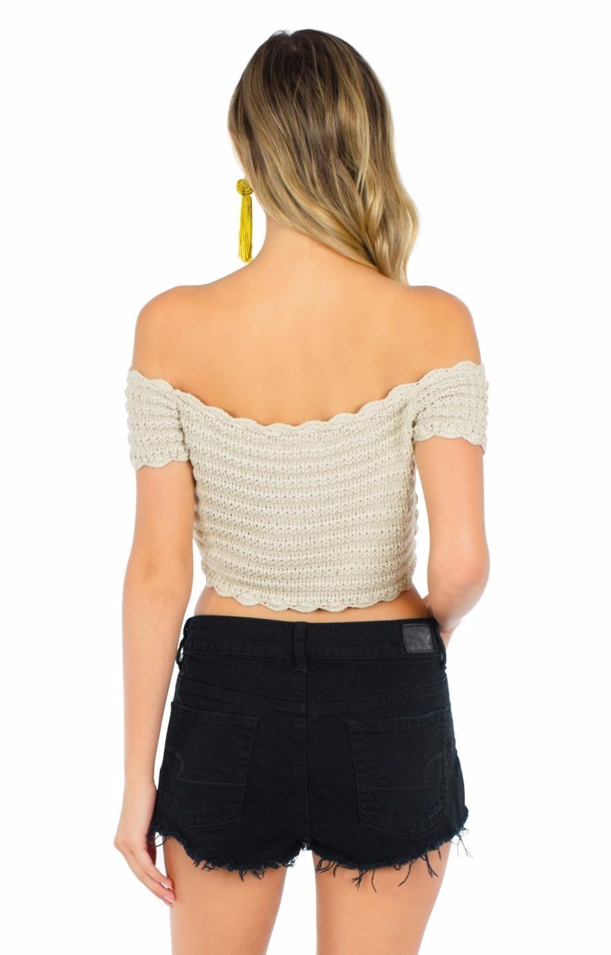 Women outfit in a top rental from WYLDR called Break The Rules Crochet Crop Top