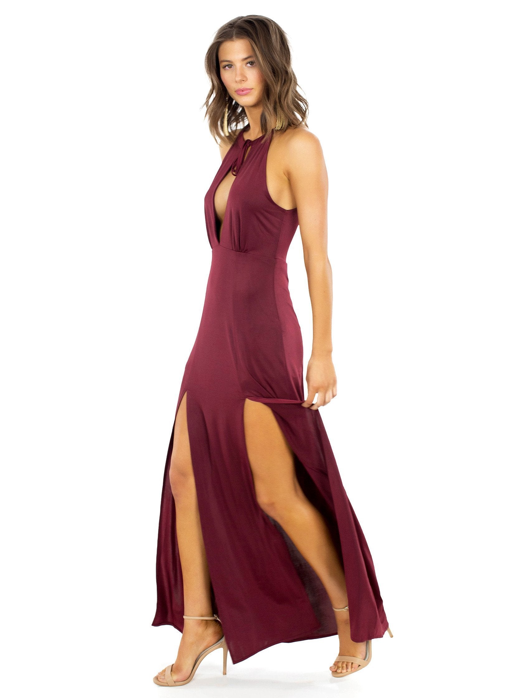 Woman wearing a dress rental from WYLDR called Out Of My League Maxi Dress