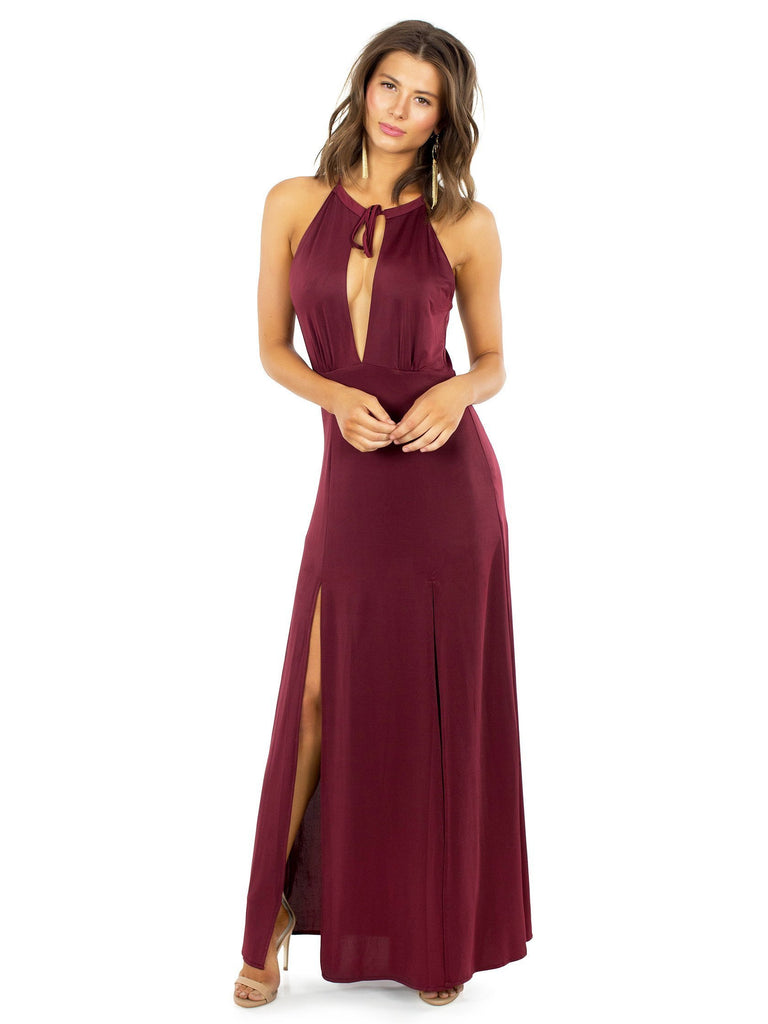 Woman wearing a dress rental from WYLDR called Imperial Maxi Dress