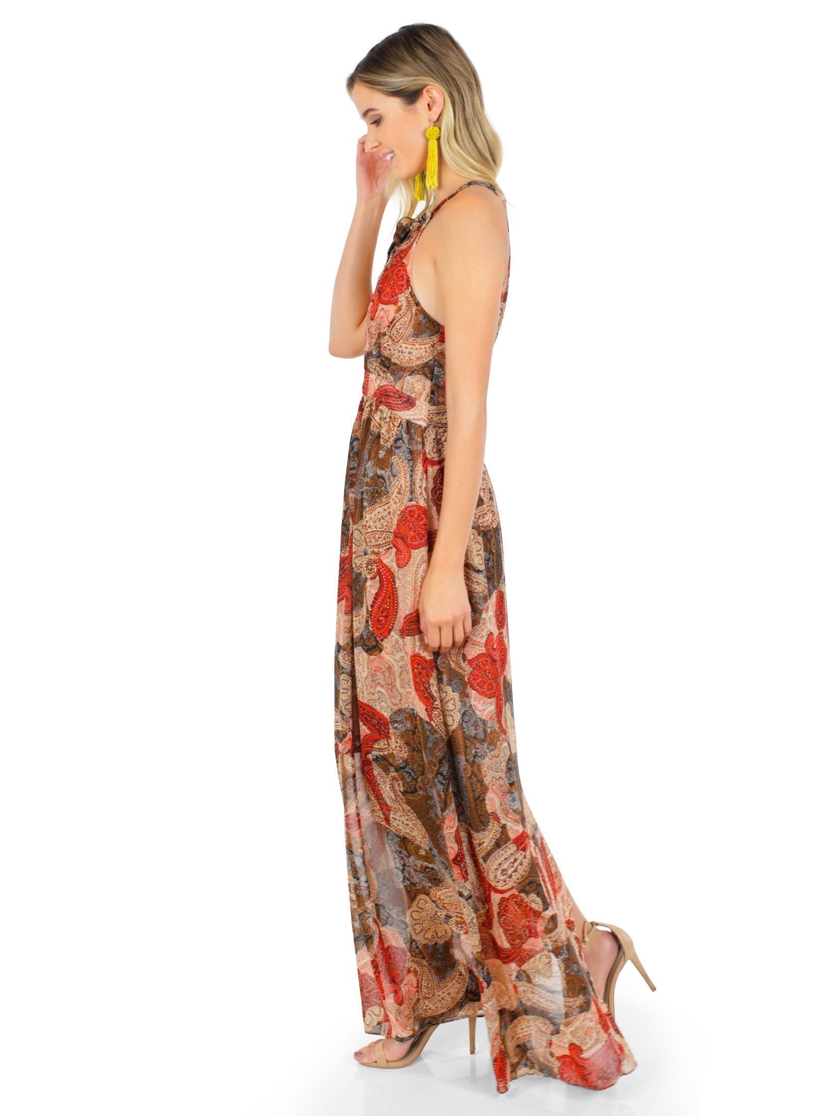 Woman wearing a dress rental from WYLDR called Paint The Sky Maxi Dress