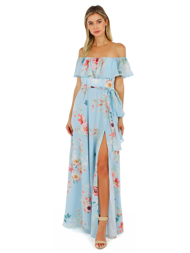 Woman wearing a dress rental from YUMI KIM called Because Of You Maxi Dress