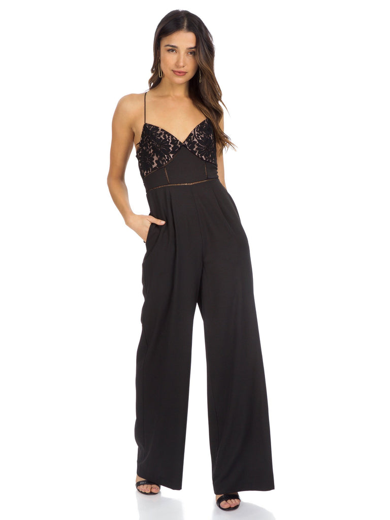 Women wearing a jumpsuit rental from YUMI KIM called Perfect Plunge Maxi Dress